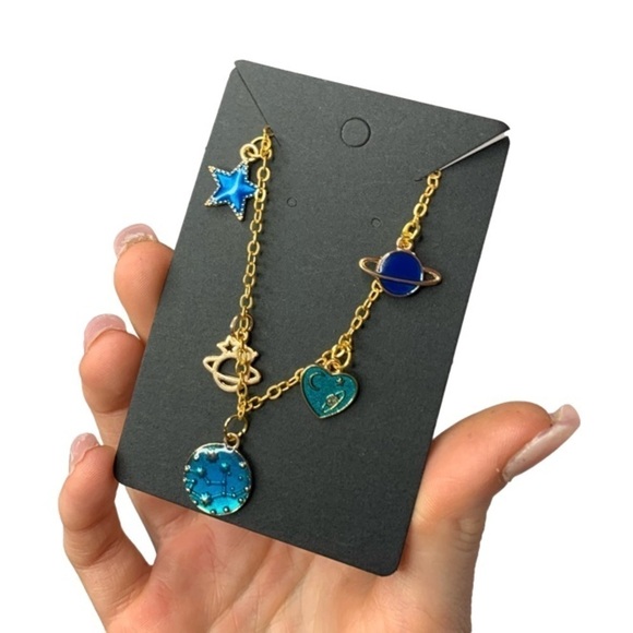carrotclassics Jewelry - Galaxy gold charm bracelet